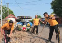 Bersihkan Pasar Kebonagung, Kapolres Pasuruan Kota Pimpin Kurve Bersama Warga Wujudkan Green Policing